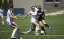 Random Lake/Ozaukee's Abby Depies fought for the ball against Xavier on Friday in a Division 4 state semifinal at Uihlein Park in Milwaukee.