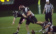 Grafton's Hudson Miller sacked Greenfield quarterback Luke O'Brien and forced a fumble that John Boesch recovered. Grafton won its first-round playoff game at Greenfield on Friday, 24-17.